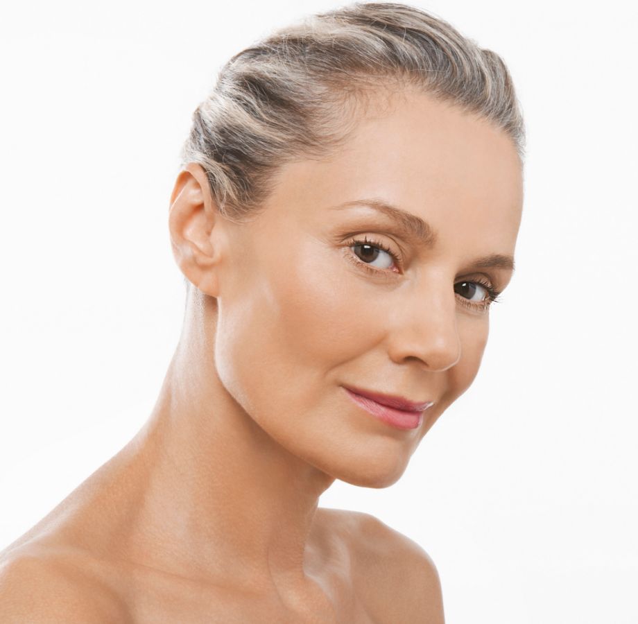 a mature woman against a white background